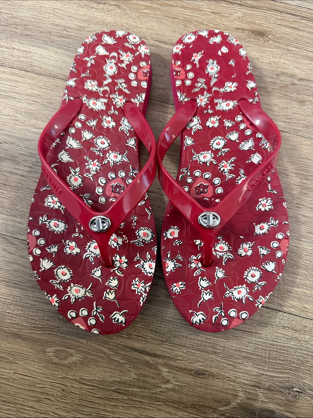 Coach Red Floral Flip Flops with Silver Logo Accent
